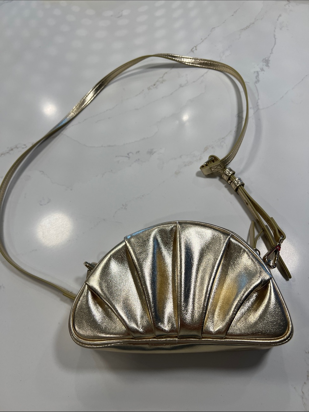 Metallic Gold Pleated Shell Crossbody Bag with Tassel Accent